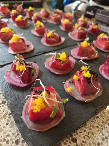 One bites of salmon and passion fruit